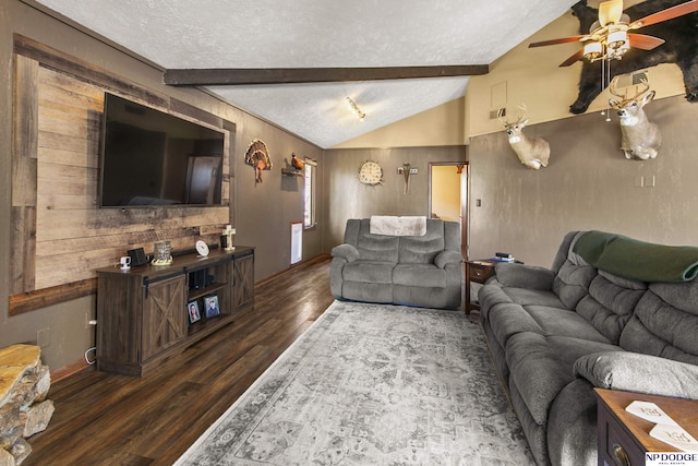 S-44 Poehling Ln, Fremont, NE 68025 - living area with wood finished floors, ceiling fan, baseboards, and a textured ceiling