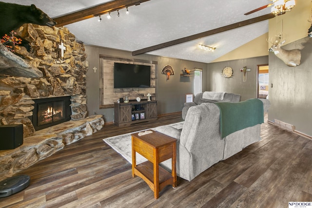 S-44 Poehling Ln, Fremont, NE 68025 - living area featuring a fireplace, wood finished floors, ceiling fan, and baseboards