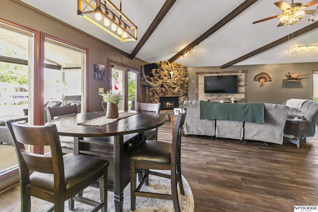 S-44 Poehling Ln, Fremont, NE 68025 - dining room with a fireplace, dark wood-style flooring, beamed ceiling, and a ceiling fan