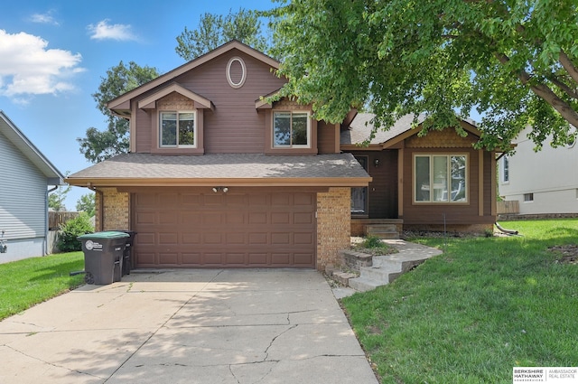12335 Wirt St, Omaha, NE 68164 - view of front of home with a front lawn, driveway, a garage, and brick siding