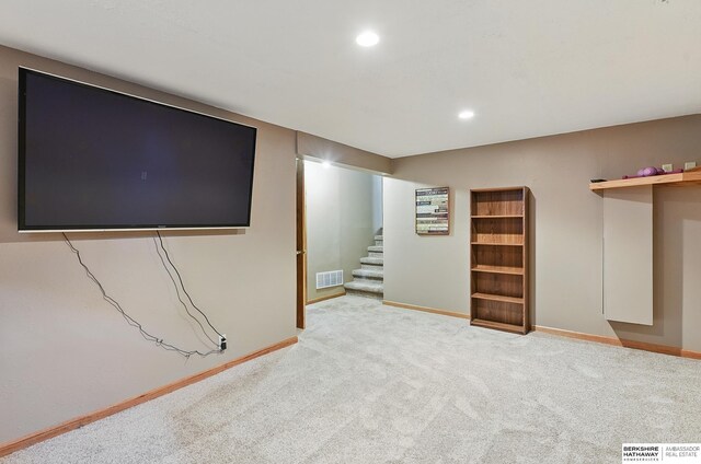 12335 Wirt St, Omaha, NE 68164 - finished basement featuring baseboards, carpet floors, stairs, and recessed lighting
