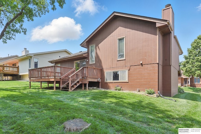 12335 Wirt St, Omaha, NE 68164 - rear view of property with a chimney, a deck, and a lawn