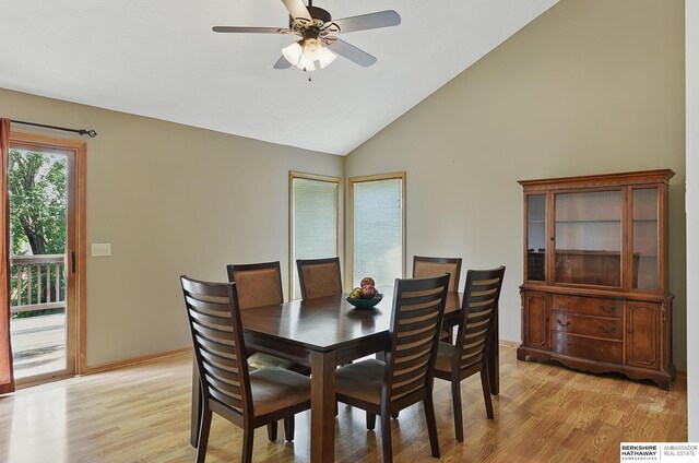 12335 Wirt St, Omaha, NE 68164 - dining room featuring light wood-style floors, a ceiling fan, and high vaulted ceiling