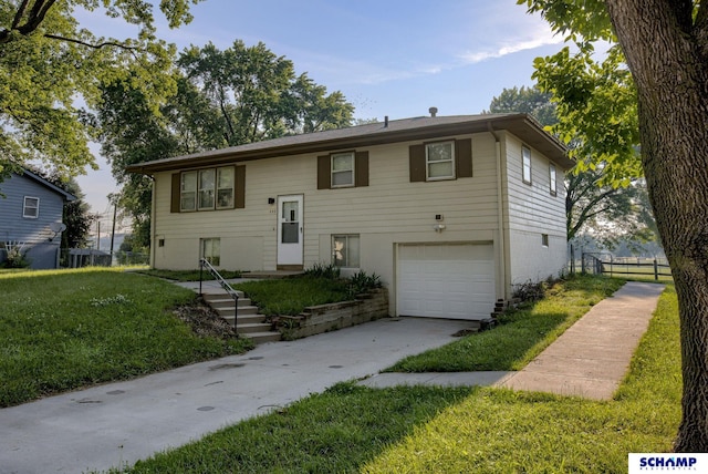 253 S 110th St, Omaha, NE 68154 - view of front facade featuring a garage and driveway