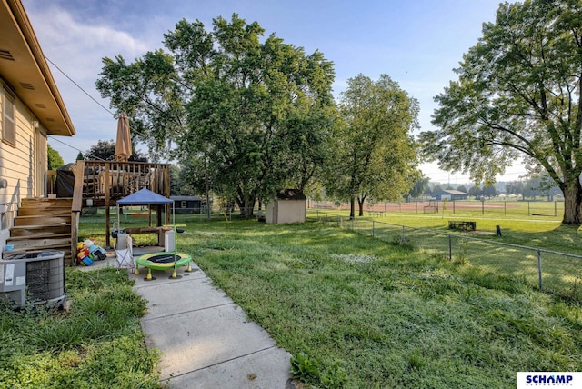 253 S 110th St, Omaha, NE 68154 - view of yard with cooling unit, a wooden deck, and stairway