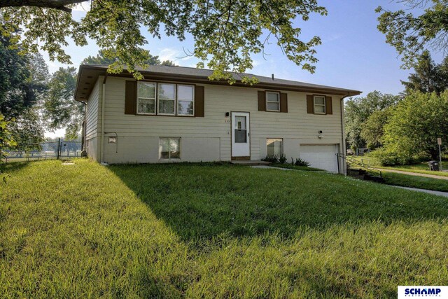 253 S 110th St, Omaha, NE 68154 - bi-level home with an attached garage