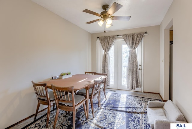 253 S 110th St, Omaha, NE 68154 - dining area with baseboards and ceiling fan