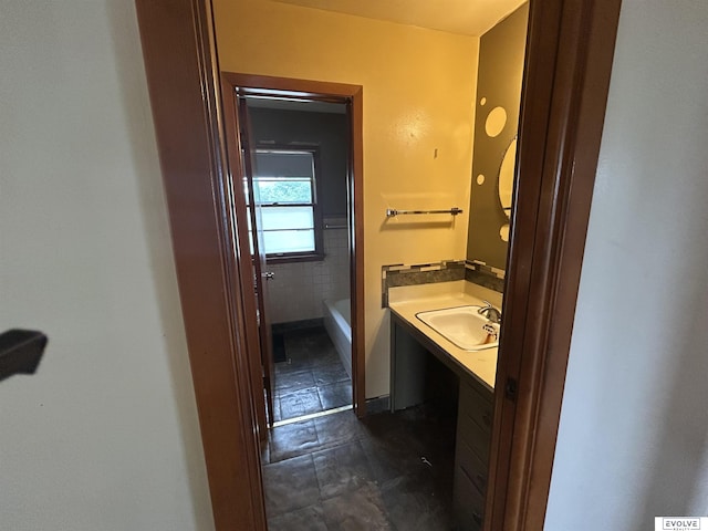 5329 N 47th St, Omaha, NE 68104 - full bathroom featuring vanity, tile patterned floors, and a tub to relax in