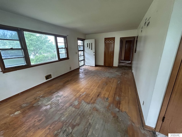 5329 N 47th St, Omaha, NE 68104 - unfurnished living room featuring hardwood / wood-style flooring