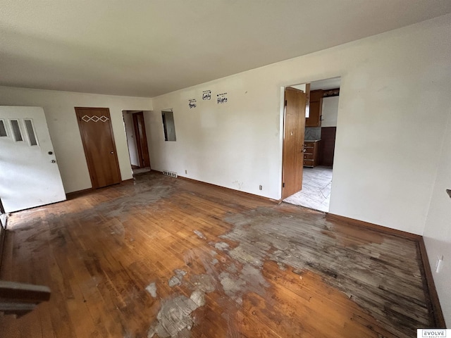 5329 N 47th St, Omaha, NE 68104 - empty room with wood-type flooring and baseboards