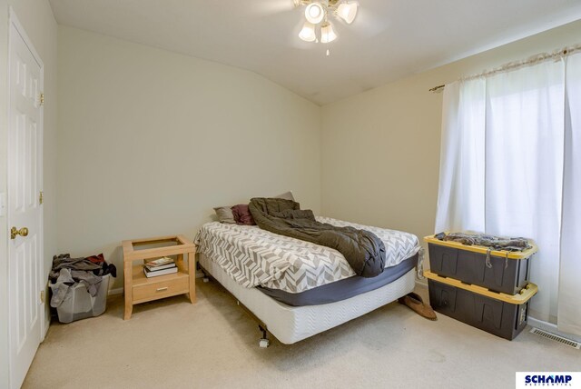 17103 Taylor St, Omaha, NE 68116 - bedroom with carpet floors, vaulted ceiling, a ceiling fan, and baseboards