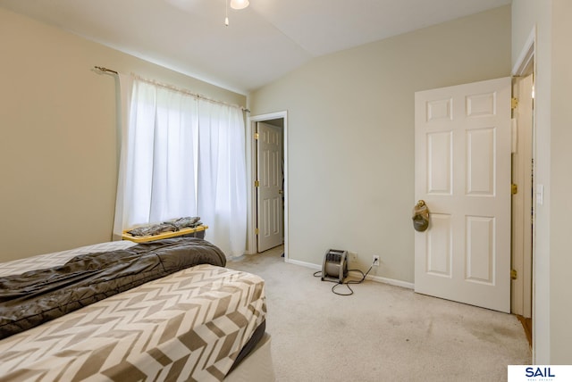 17103 Taylor St, Omaha, NE 68116 - bedroom with light carpet, lofted ceiling, and baseboards