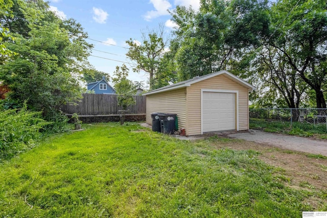 1444 S 16th St, Omaha, NE 68108 - detached garage featuring asphalt driveway