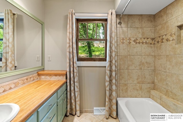 17409 Webster Blvd, Plattsmouth, NE 68048 - bathroom with vanity, tile patterned floors, and shower / tub combo with curtain