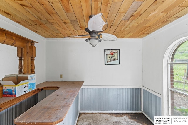 17409 Webster Blvd, Plattsmouth, NE 68048 - bar area with wood ceiling, ceiling fan, and concrete floors