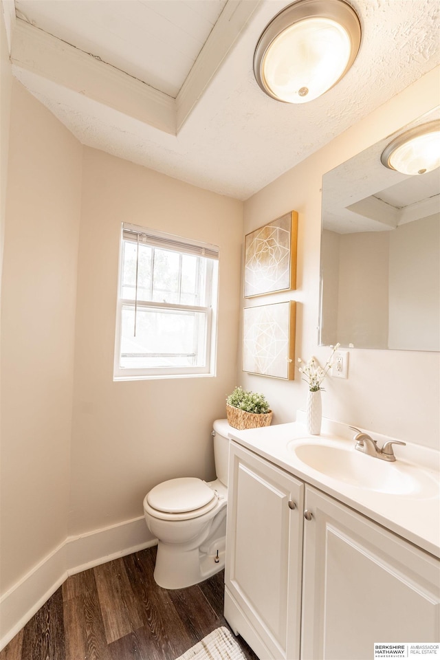 4328 Burdette St, Omaha, NE 68111 - bathroom featuring toilet, wood finished floors, vanity, and baseboards