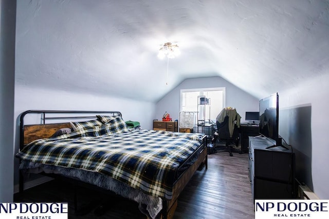 4023 Maple St, Omaha, NE 68111 - bedroom featuring lofted ceiling, wood finished floors, and a desk