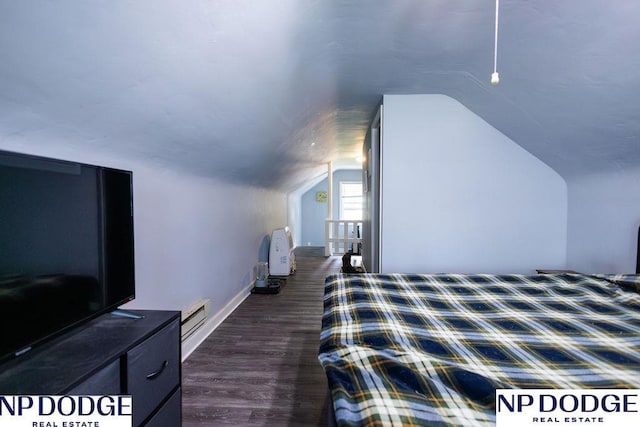 4023 Maple St, Omaha, NE 68111 - bedroom with vaulted ceiling, baseboards, and dark wood-type flooring