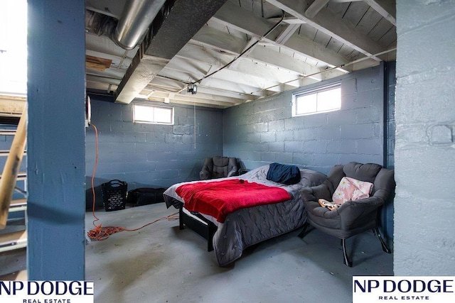 4023 Maple St, Omaha, NE 68111 - bedroom with concrete flooring