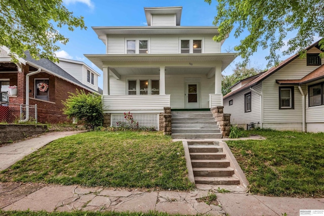 620 Dorcas St, Omaha, NE 68108 - traditional style home with a porch and a front lawn