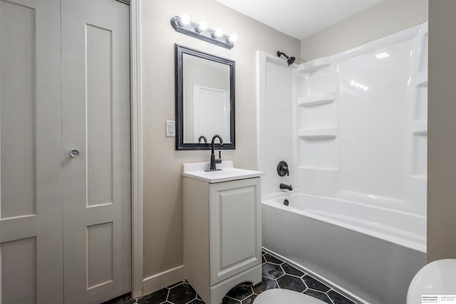 620 Dorcas St, Omaha, NE 68108 - bathroom with vanity, toilet,  shower combination, tile patterned floors, and baseboards