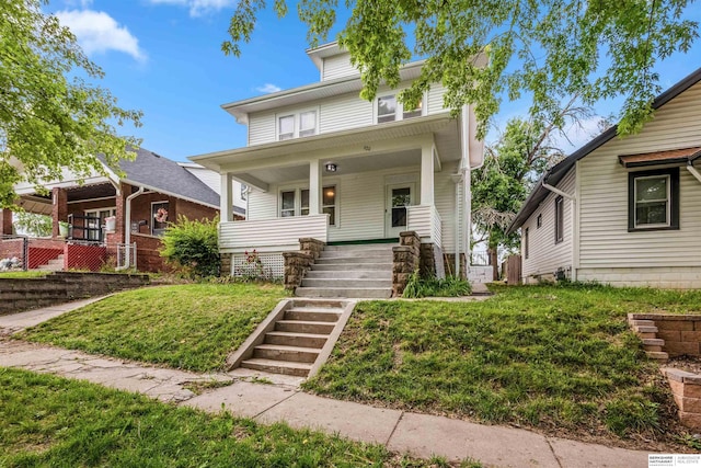 620 Dorcas St, Omaha, NE 68108 - traditional style home with covered porch, stairs, and a front yard