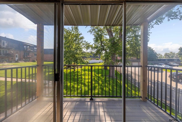 12749 Woodcrest Plz Unit 211B, Omaha, NE 68137 - wooden terrace featuring a yard