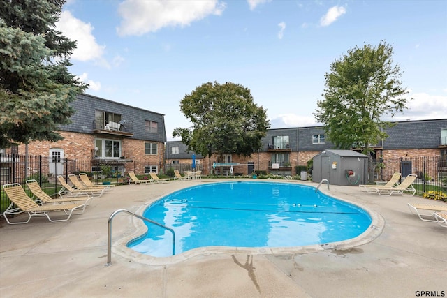 12749 Woodcrest Plz Unit 211B, Omaha, NE 68137 - community pool featuring a patio area