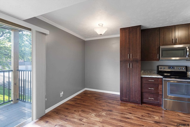 12749 Woodcrest Plz Unit 211B, Omaha, NE 68137 - kitchen with appliances with stainless steel finishes, healthy amount of natural light, dark wood-type flooring, crown molding, and a textured ceiling
