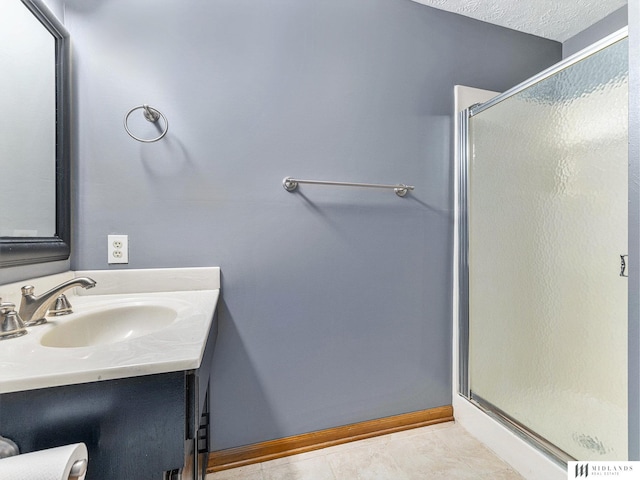 7824 La Vista Dr, La Vista, NE 68128 - bathroom with a shower stall, vanity, and tile patterned flooring
