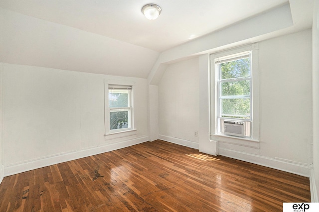 4701 Davenport St, Omaha, NE 68132 - additional living space featuring hardwood / wood-style floors, healthy amount of natural light, lofted ceiling, and cooling unit