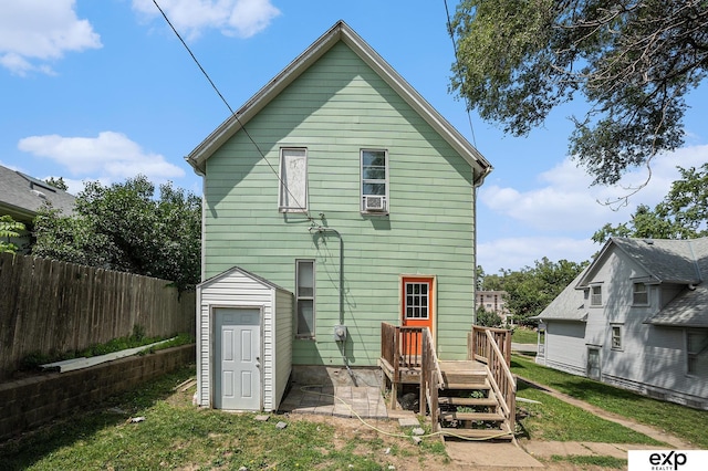 4701 Davenport St, Omaha, NE 68132 - rear view of house with a deck and a patio area