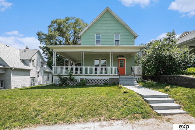 4701 Davenport St, Omaha, NE 68132 - view of front of house with a porch and a front lawn