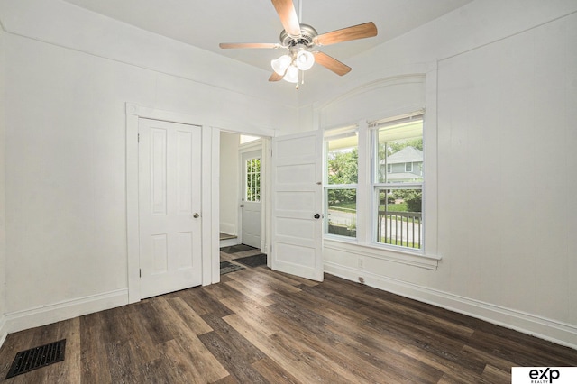 4701 Davenport St, Omaha, NE 68132 - empty room with dark wood-type flooring and a ceiling fan
