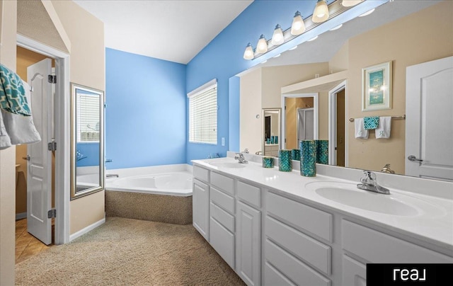 19887 I St, Omaha, NE 68135 - full bathroom featuring double vanity, a bath, and a shower stall