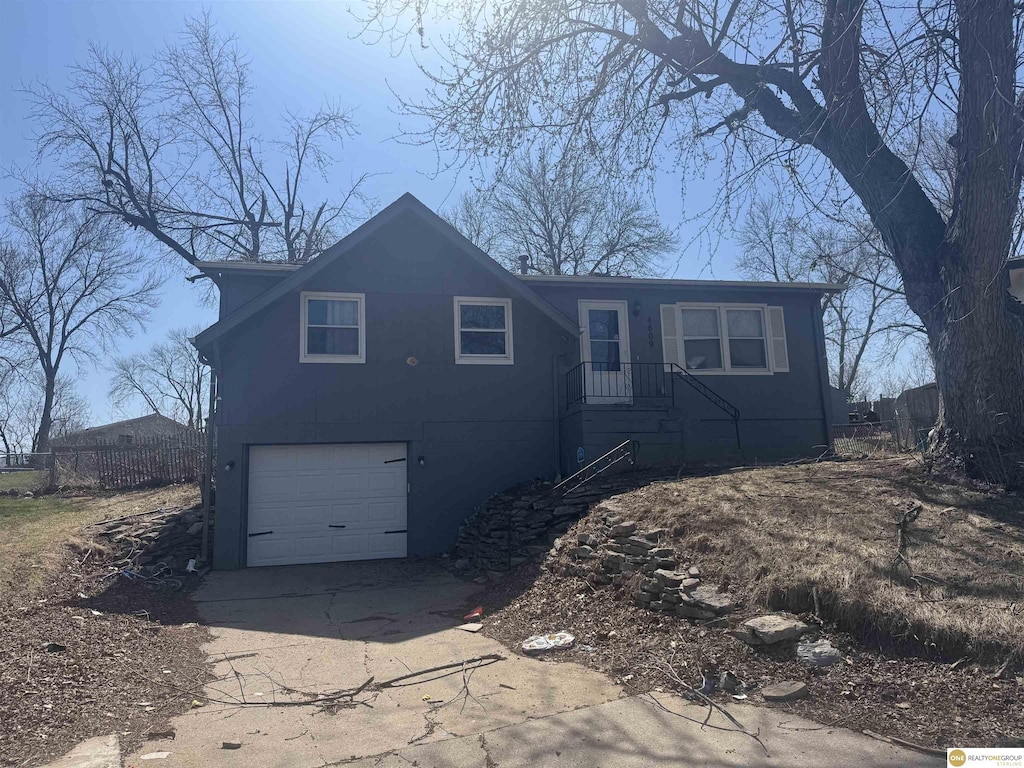 4809 N 130th Cir, Omaha, NE 68164 - view of front of property with an attached garage and driveway