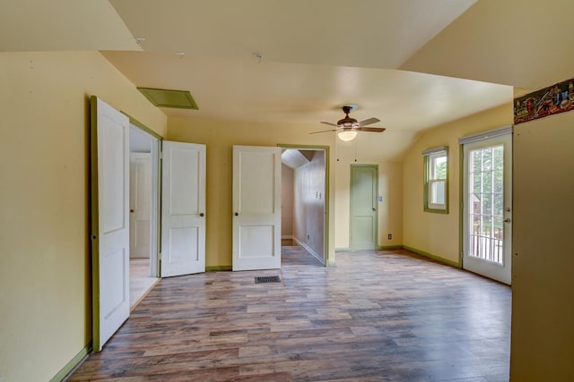 902 S 57th St, Omaha, NE 68106 - empty room featuring wood finished floors, a ceiling fan, and lofted ceiling