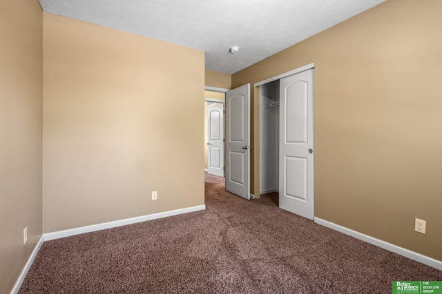 14463 Reynolds St, Omaha, NE 68007 - unfurnished bedroom featuring carpet flooring and a closet