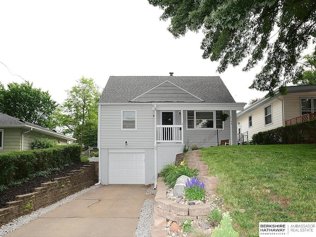 6144 Seward St, Omaha, NE 68104 - view of front of house with a garage, driveway, a front lawn, and roof with shingles
