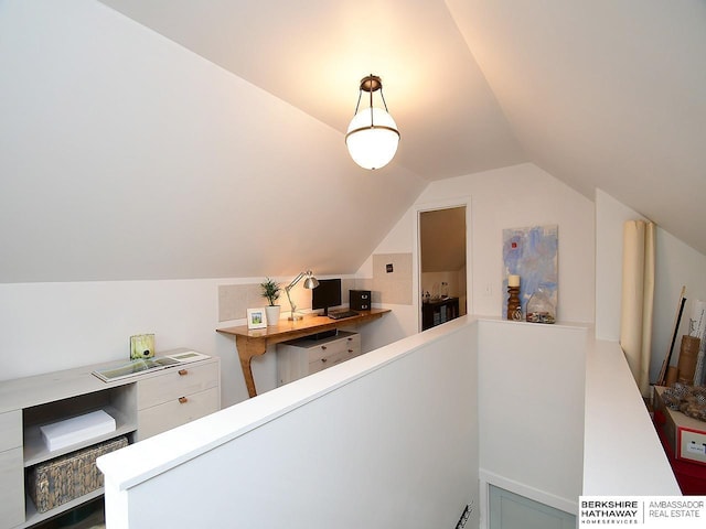 6144 Seward St, Omaha, NE 68104 - corridor featuring lofted ceiling and an upstairs landing