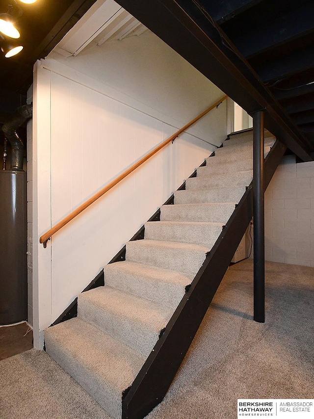6144 Seward St, Omaha, NE 68104 - stairs with carpet floors and water heater