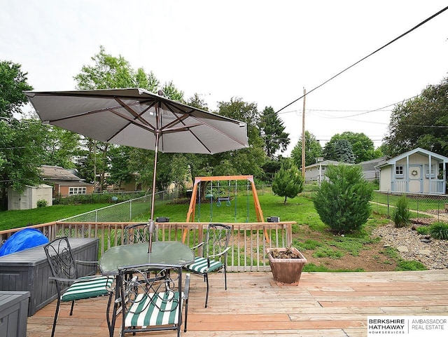 6144 Seward St, Omaha, NE 68104 - deck with a playground and outdoor dining area