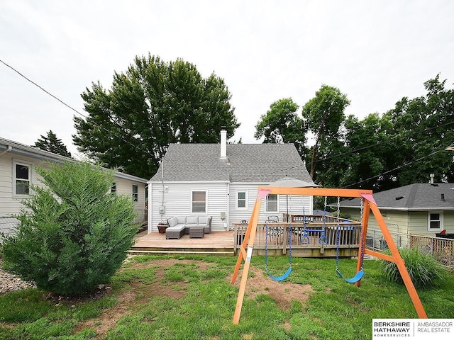 6144 Seward St, Omaha, NE 68104 - rear view of house featuring a playground, outdoor lounge area, and a deck