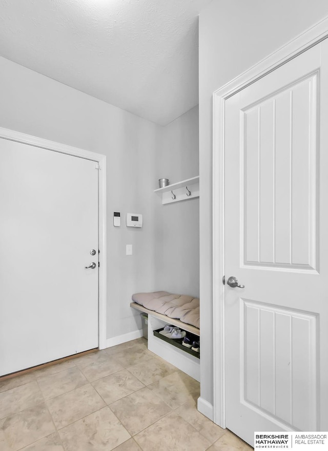 14807 S 24th St, Bellevue, NE 68123 - mudroom featuring light tile patterned floors and baseboards