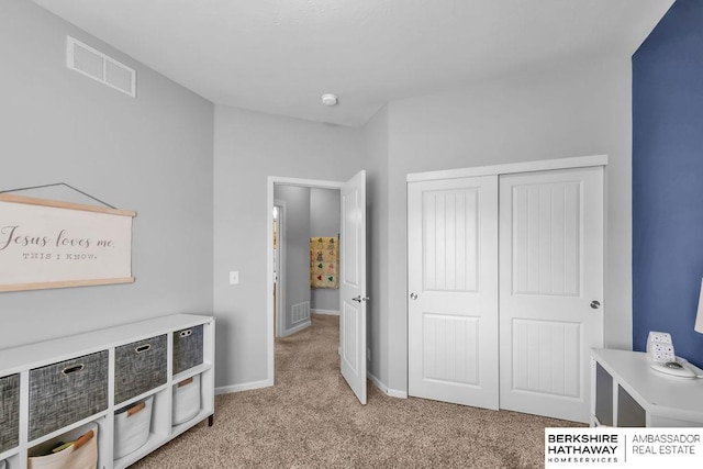 14807 S 24th St, Bellevue, NE 68123 - unfurnished bedroom featuring light carpet, baseboards, and a closet