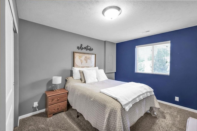 14807 S 24th St, Bellevue, NE 68123 - carpeted bedroom featuring a textured ceiling and baseboards