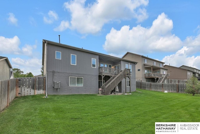 14807 S 24th St, Bellevue, NE 68123 - rear view of property with stairway, a wooden deck, and brick siding