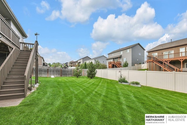 14807 S 24th St, Bellevue, NE 68123 - view of yard featuring stairs, a residential view, and a wooden deck