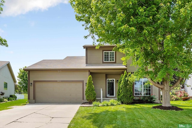 4602 N 155th Ave, Omaha, NE 68116 - traditional-style house featuring driveway, an attached garage, and a front yard