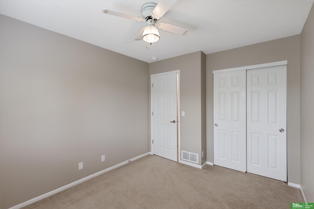 4602 N 155th Ave, Omaha, NE 68116 - unfurnished bedroom with light colored carpet, baseboards, a closet, and ceiling fan